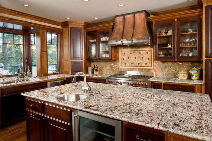 Bianco Antico Granite countertops feature a soft gray background with warm taupe and pink flecks. In addition to countertops, this beautiful granite can be used for coordinating backsplashes, accent walls, and floors. Granite is recommended for both residential and commercial projects, and can be used in exterior projects for wall cladding, landscaping, and countertops. Standard Countertop Sizes 112 inch x 26 inch x 2 CM Flat Finish 2 cm countertops have 1½ inch laminated flat edge on one long s Cleaning Granite Countertops, Granite Kitchen Counters, Brown Kitchen Cabinets, Outdoor Kitchen Countertops, Marble Countertops Kitchen, Diy Terrarium, Countertop Colours, Granite Countertop, Granite Countertops Kitchen