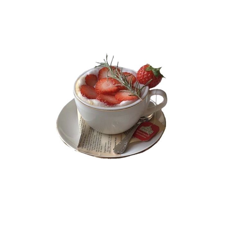 strawberries in a white bowl on a saucer