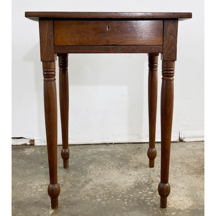 Antique handmade wood side table with single drawer. Simple classic shape with a beautiful patina, turned legs and carved ball feet. Drawer features decorative brass keyhole but no key. No knob. Interior drawer measures 13" x 13" square.  Vintage age wear. Repaired crack to top. Sturdy construction. No key, no knob to drawer. Wood Night Table, Antique Side Table, Side Table With Drawer, Wood Side Table, Vintage Side Table, Wooden Side Table, Antique Wood, Side Table Wood, How To Antique Wood