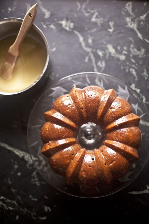 a bundt cake sitting on top of a glass plate