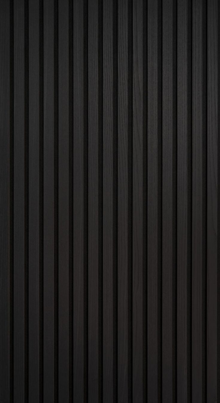 black wood texture background with vertical lines and horizontal stripeing on the bottom right corner