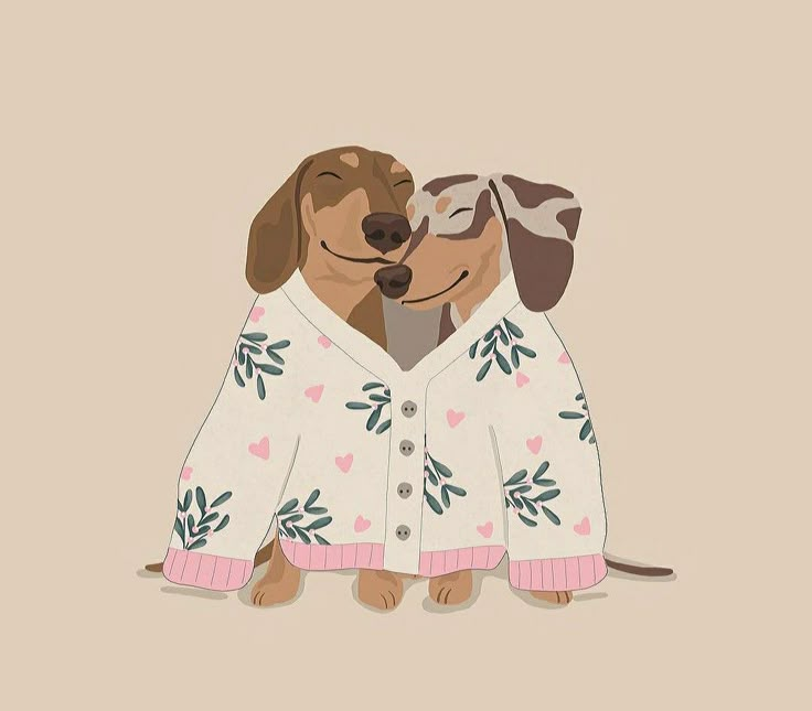 two dogs wearing sweaters with hearts on them, one is hugging the other's head