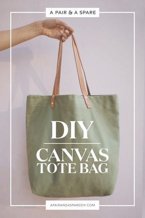 a hand holding a bag with the words diy canvas tote bag