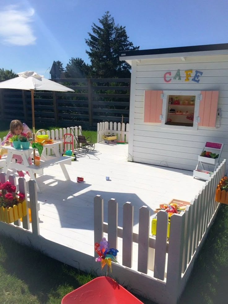 a child's play area in the back yard