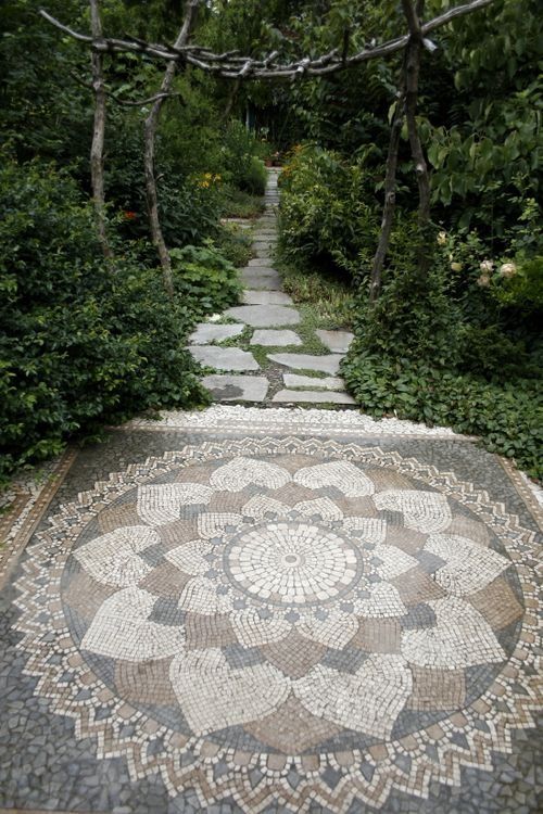 a stone path in the middle of some trees