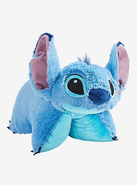 the stuffed animal is blue and has ears that look like an elephant's head