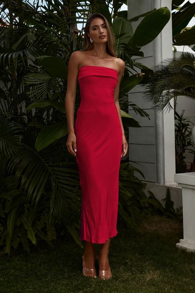 Featuring a classic slip style and a double folded strapless neckline, our Perez Long Midi Dress will be your go-to event dress. - Long midi length- Strapless neckline with gel tape- Double folded detail around neckline- Centre back invisible zipper- Lined without stretch- Fabric: 51% Viscose & 49% Rayon, Lining: 100% PolyesterPlease refer to care label for garment care instructions, Colours may appear slightly different to the website due to lighting, computer picture resolution and monitor settings. ~section~ Length: 113cm/44.5inches (Highest shoulder point to hem taken from size S). It is true to size. If you need more help with sizing, see our size guide or email us at sales@runawaythelabel.com ~section~ Mariah wears a size AU6 / XS / US 2 and is 178cm tall. Strapless Midi Dress Formal, Red Strapless Dress Outfit, Red Maxi Dress Formal, Maroon Silk Dress, Elegant Red Dresses, Red Wedding Guest Dress, Strapless Dress Outfit, Red Dress Midi, Red Maxi Dresses