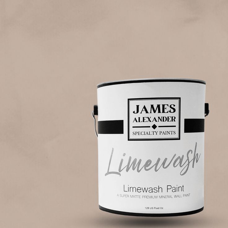 a white paint can with the words limewash painted on it's side, in front of a beige background