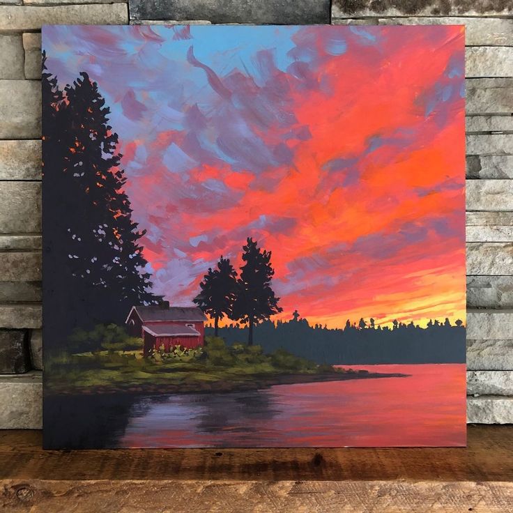 a painting of a sunset over a lake