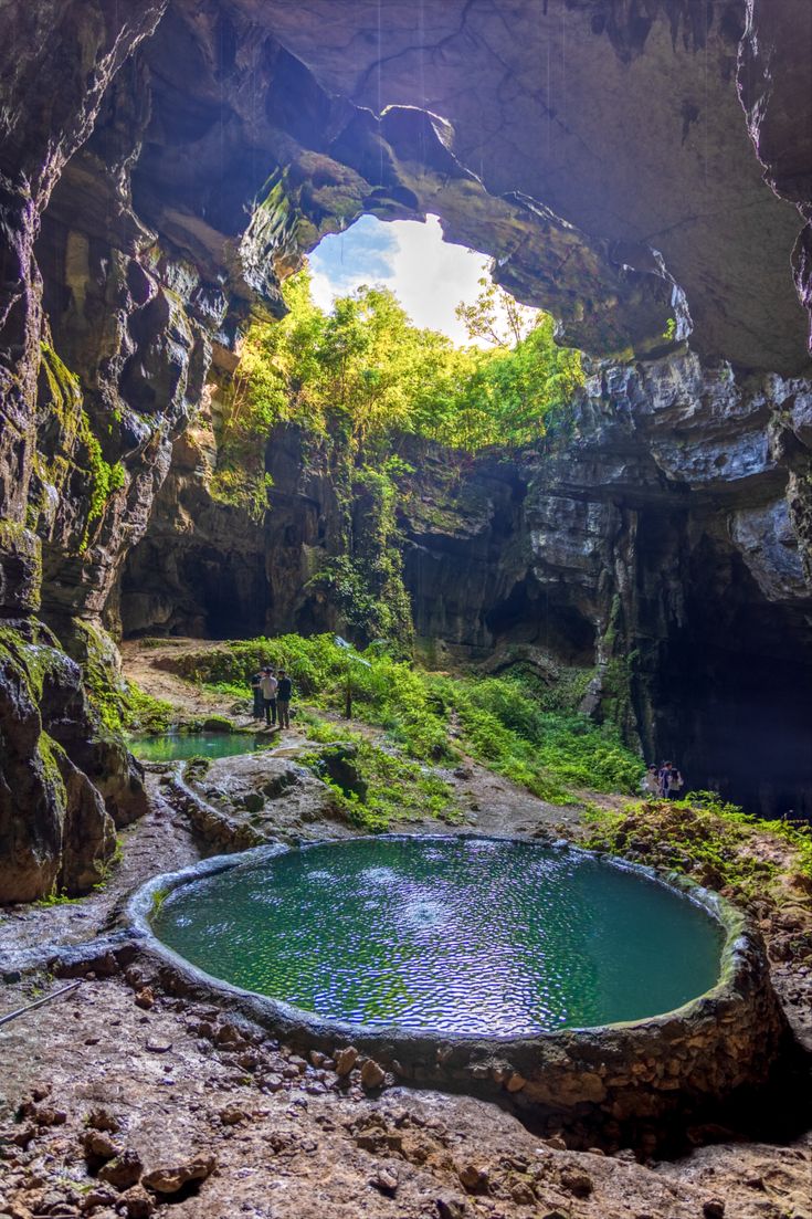 a pool in the middle of a cave