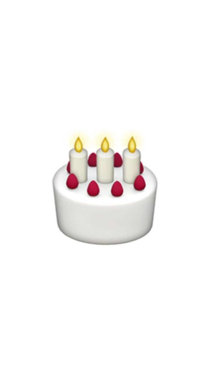 a small white cake with red and yellow candles on it's top, sitting in front of a white background