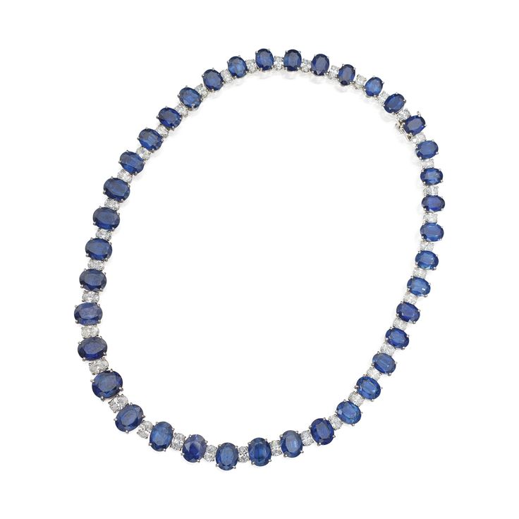 Platinum, Sapphire and Diamond Necklace The slightly graduated row, set with 38 oval-shaped sapphires weighing approximately 98.50 carats, alternating with oval-shaped diamonds weighing approximately 15.00 carats, length 16 inches. Sothebys Art, Magnificent Jewels, Jewel Box, Fine Jewels, Sapphire Jewelry, Art Auction, Girls Best Friend, Live Lokai Bracelet, Blue Sapphire