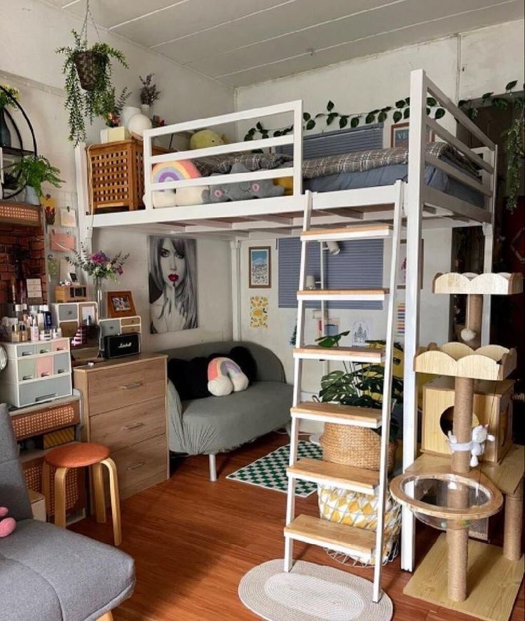 a loft bed is in the middle of a living room