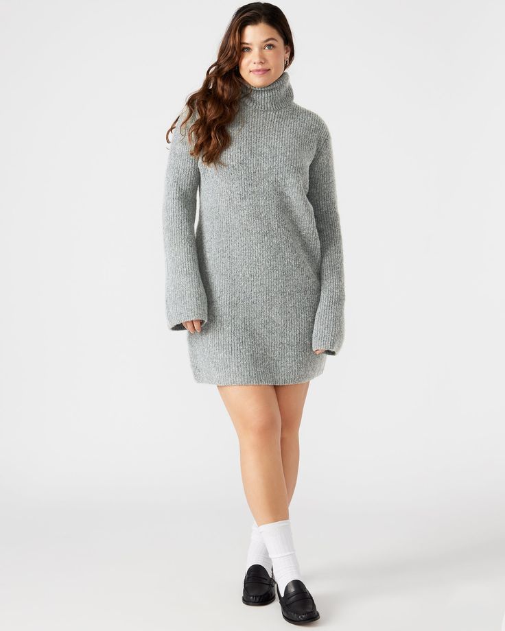 The ABBIE sweater dress is expertly crafted with a turtleneck and flare sleeves and offers a relaxed yet stylish fit. The soft brushed material provides warmth and comfort, making it the perfect mini dress for cooler weather. Elevate your wardrobe with this versatile and chic pullover dress. Mini sweater dress Turtleneck pullover style Flared long sleeves 98% polyester 2% elastane Hand wash Carla is 5ft 9in and is wearing a size large Lilia is 5ft 9in and is wearing a size small Imported Flared Sleeve Dress, Mini Sweater, Flare Sleeve Dress, Turtleneck Pullover, Flare Long Sleeve, Grey Sweater Dress, Flare Sleeves, Turtleneck Sweater Dress, Mini Sweater Dress