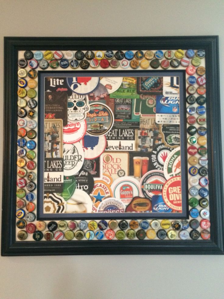 a framed bottle cap collage on the wall