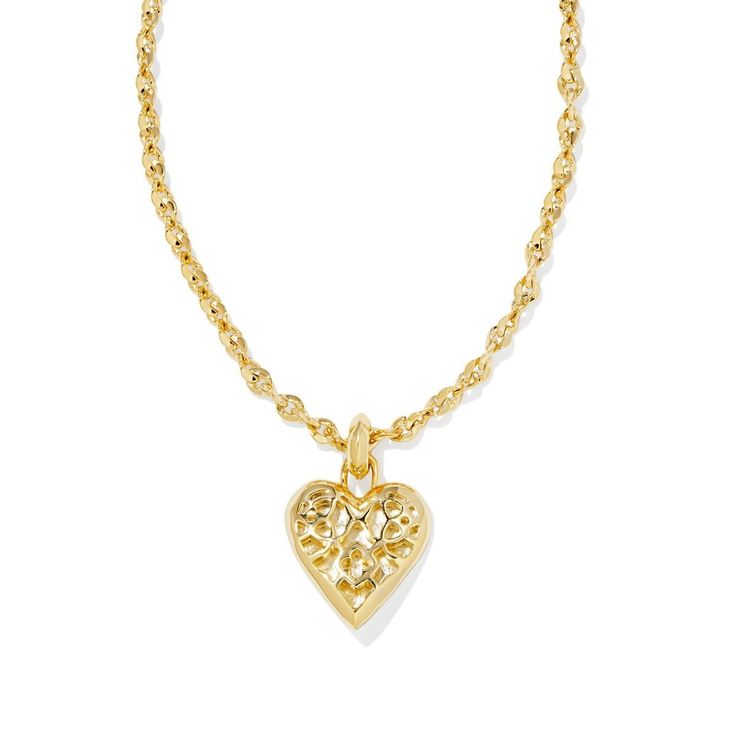 Sweet, always-on-trend, and full of shine, you can't help but fall for the Romy Statement Heart Necklace. Centered on a textured chain, this oversized heart pendant is the pop of personality your layered look needs. Designer, founder, and philanthropist Kendra Scott started her company in 2002, just three months after her first son was born. Her commitment to innovation, quality, customer service, and detail has taken her from a small startup to a billion-dollar brand. Kendra Scott is known for Kendra Scott Heart Necklace Clear, Bat Mitzvah Party, Necklace Inspiration, Necklaces Gold, Bow Necklace, Gold Heart Necklace, Accessories Jewelry Necklace, Gold Pendant Necklace, Layered Look