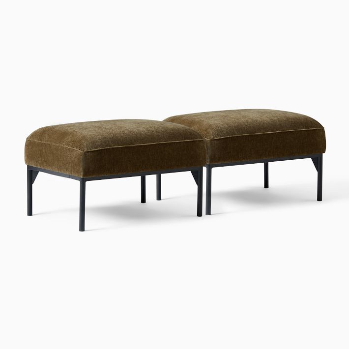 a pair of footstools in brown fabric