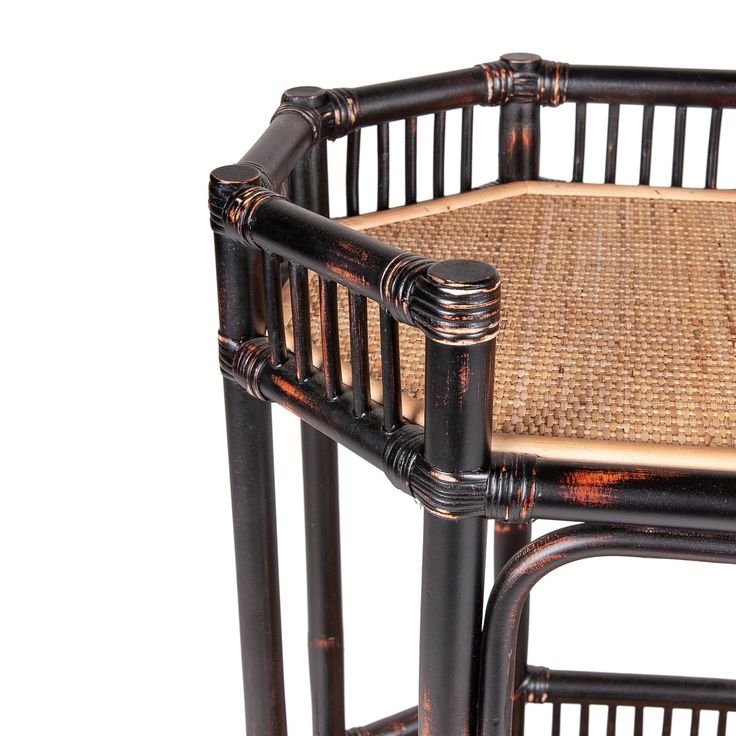 a wicker chair with woven seat cushion