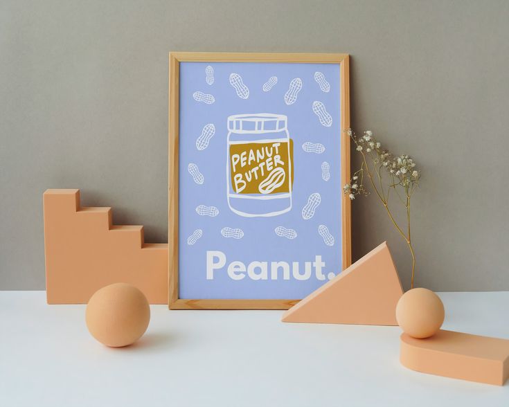 an image of peanut butter poster in front of some shapes and sizes on the table