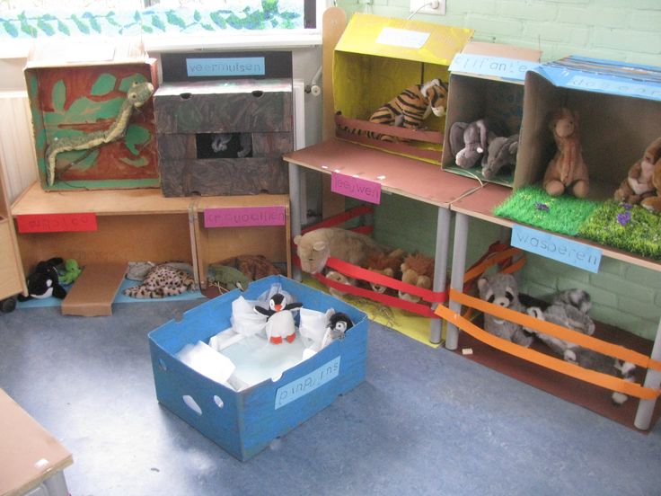 several shelves with stuffed animals in them and some toys on the floor next to each other