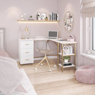 a bedroom with pink walls and white furniture