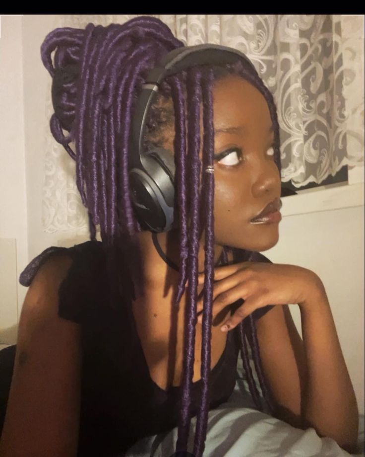 alt gothic black girl side profile purple faux locs messy bun Black And Purple Locs Black Women, Colored Braids Aesthetic, Black And Purple Faux Locs, Faux Locs Side Part, Purple Faux Locs Black Women, Purple Dreadlocks Black Women, Black Woman With Purple Hair, Dreads Side Profile, Black Women Purple Hair