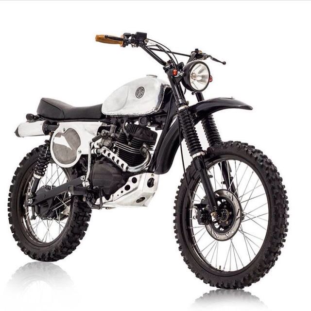 a white and black dirt bike on a white background