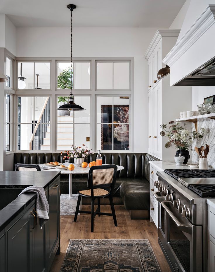 the kitchen is clean and ready to be used as a dining room or breakfast nook