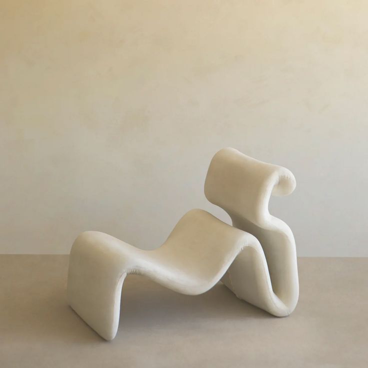 a white sculpture sitting on top of a table