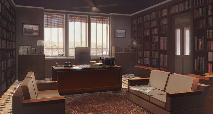 a room with many bookshelves and two couches in front of a desk