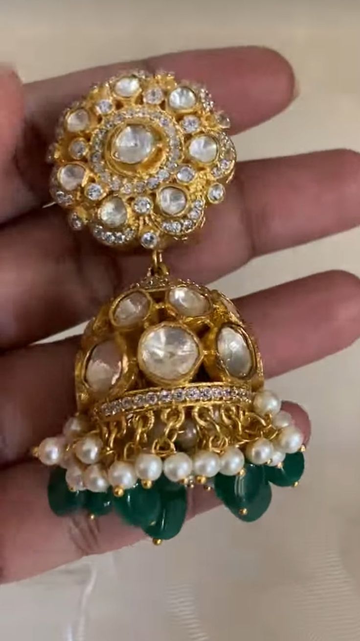 These earrings would have a luxurious, traditional jhumki design, combining modern moissanite brilliance with Kundan beauty. Desi Jewelry, Goddess Dress, Kundan Earrings, Cz Earrings, Finger Rings, Antique Earrings, American Diamond, Pendant Set, Designer Earrings