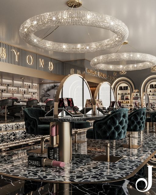 the interior of a luxury salon with chandeliers and chairs in black and gold colors