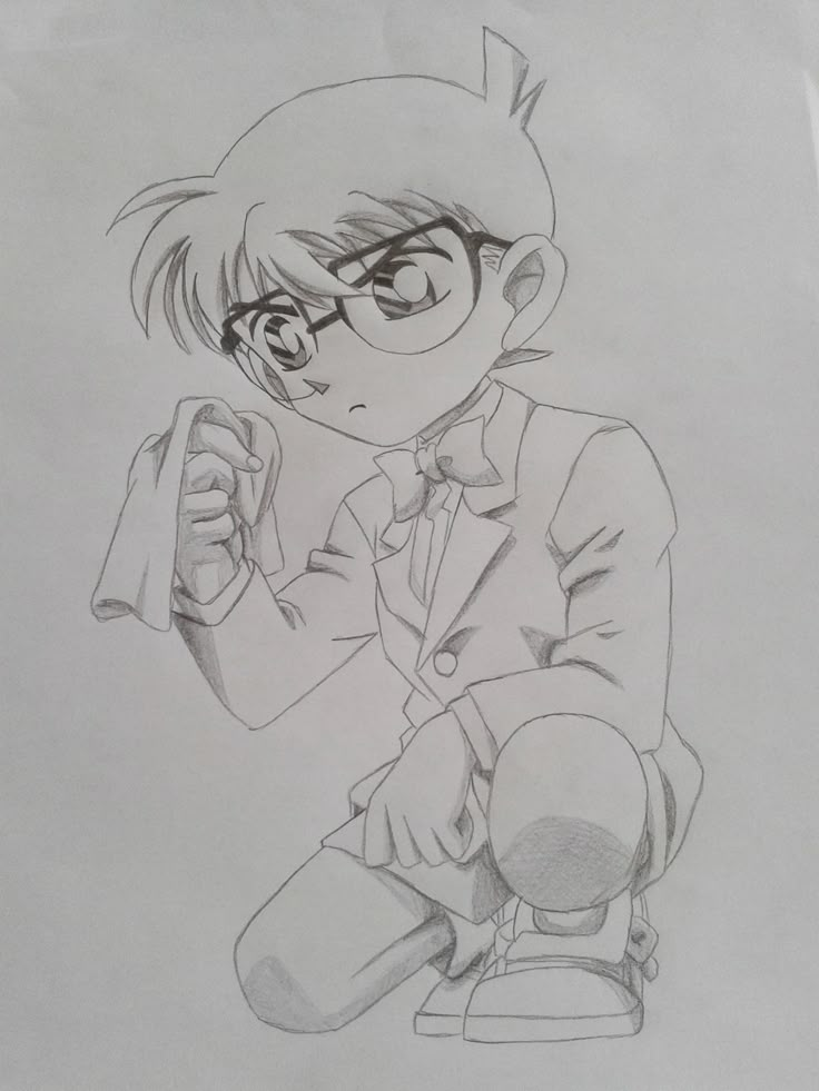 a pencil drawing of a boy in a suit and tie holding a piece of paper