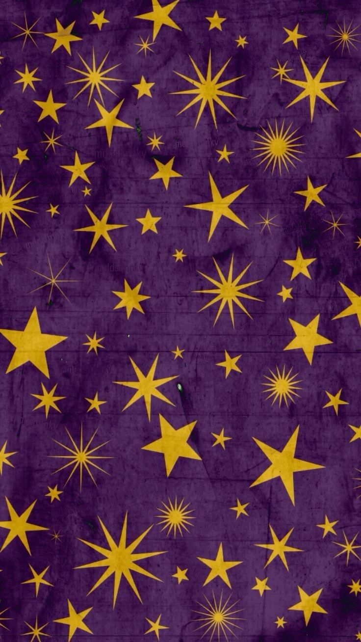 a purple background with gold stars on it