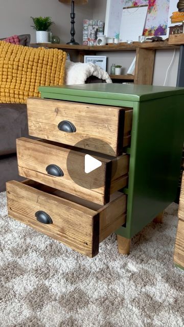 three drawers are stacked on top of each other in front of a couch and coffee table