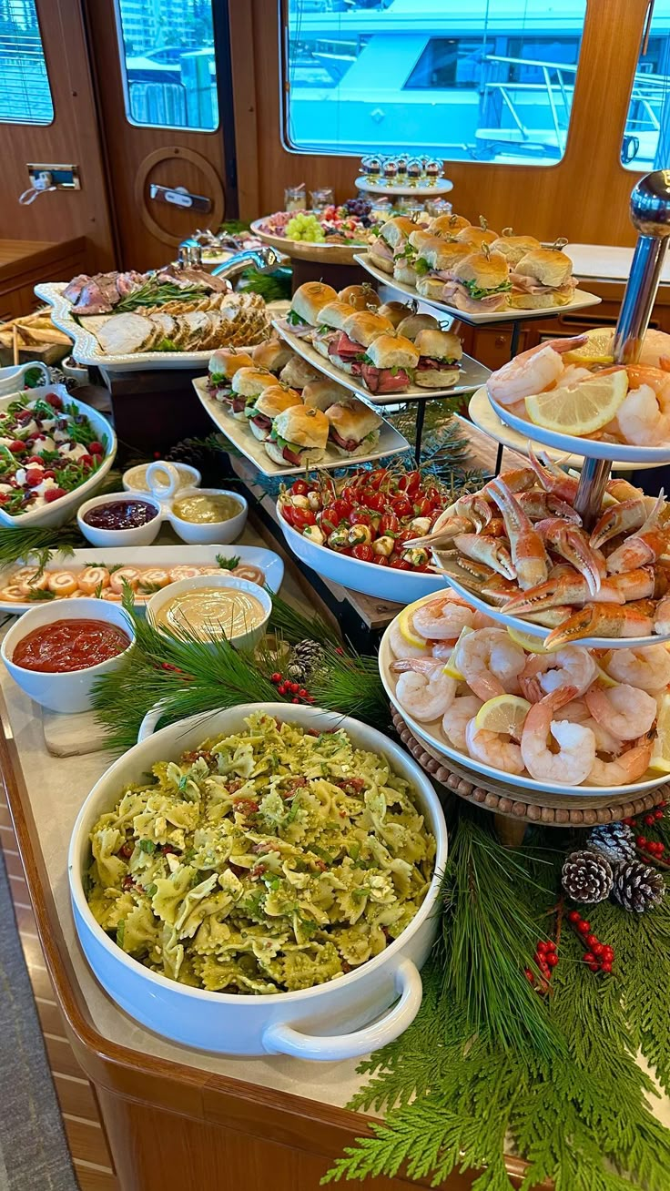 a buffet table filled with lots of food