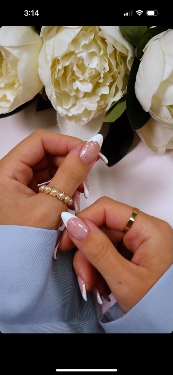 French Tip Nails Round Sparkle, Sparkly French Tip Acrylic Nails Almond, French Tip Nails White With Glitter, Wedding French Nails Sparkle, French Tip Glitter Top Coat, Sparkly French Manicure Almond, Nails To Get Engaged In, French Tip With Sparkle Nails, White French Tip Nails With Sparkles