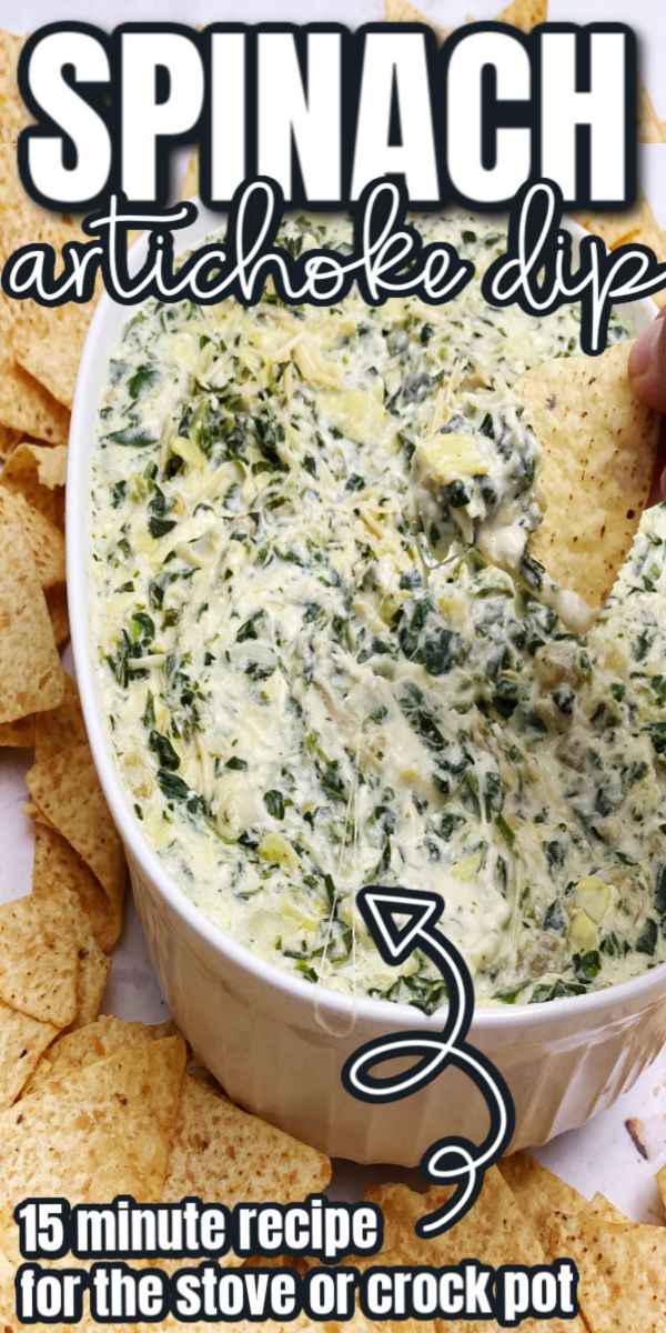 spinach artichoke dip recipe in a white bowl surrounded by tortilla chips