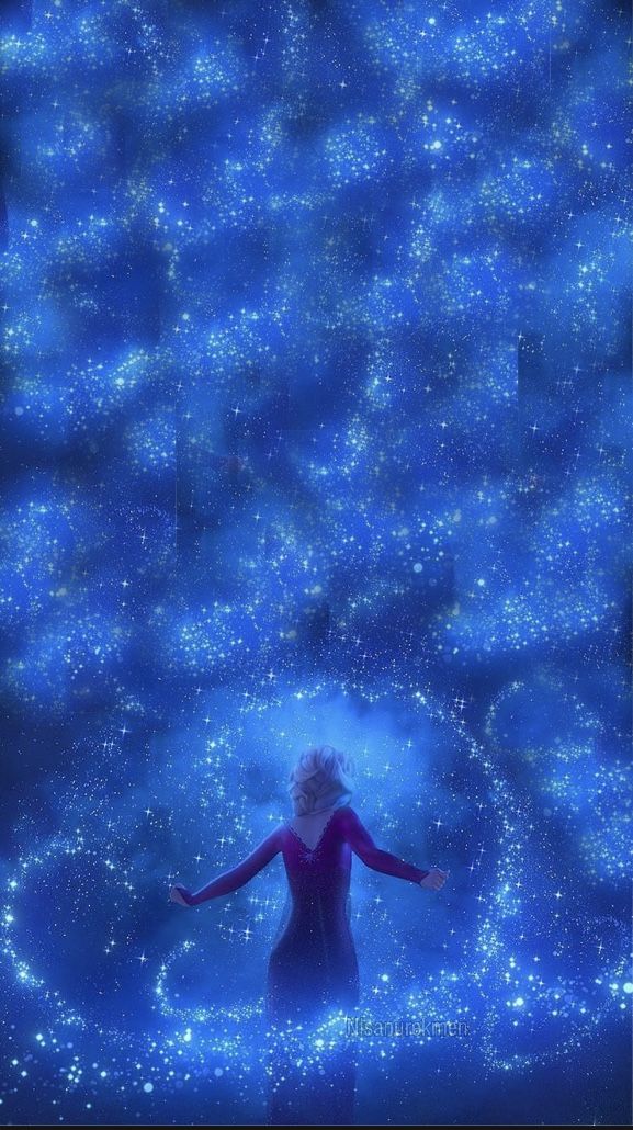 a woman standing in the middle of a blue field with stars all over her body