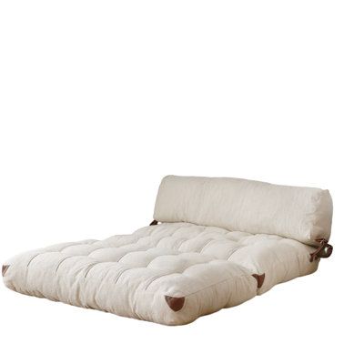 the futon bed is made from white material