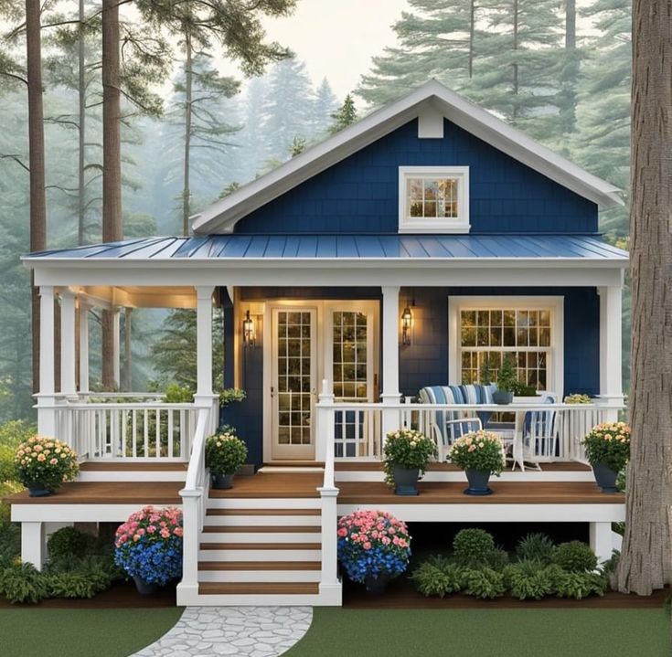 a small blue house with porch and steps leading up to the front door is shown