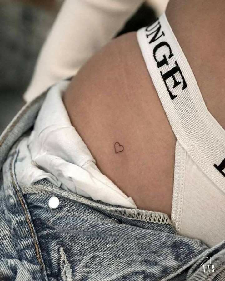 a woman's stomach with the word love on it