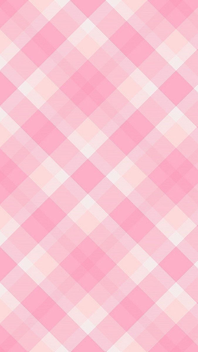 a pink and white checkered background with diagonal stripes