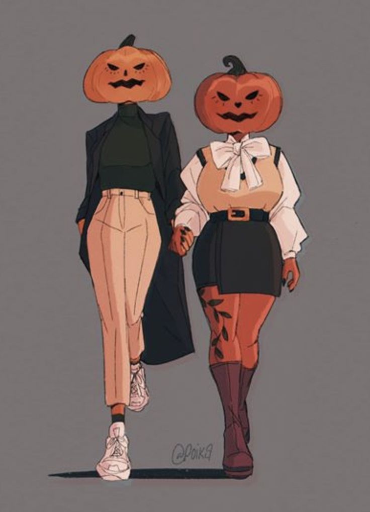 two women in halloween costumes walking down the street with pumpkins on their heads and hands