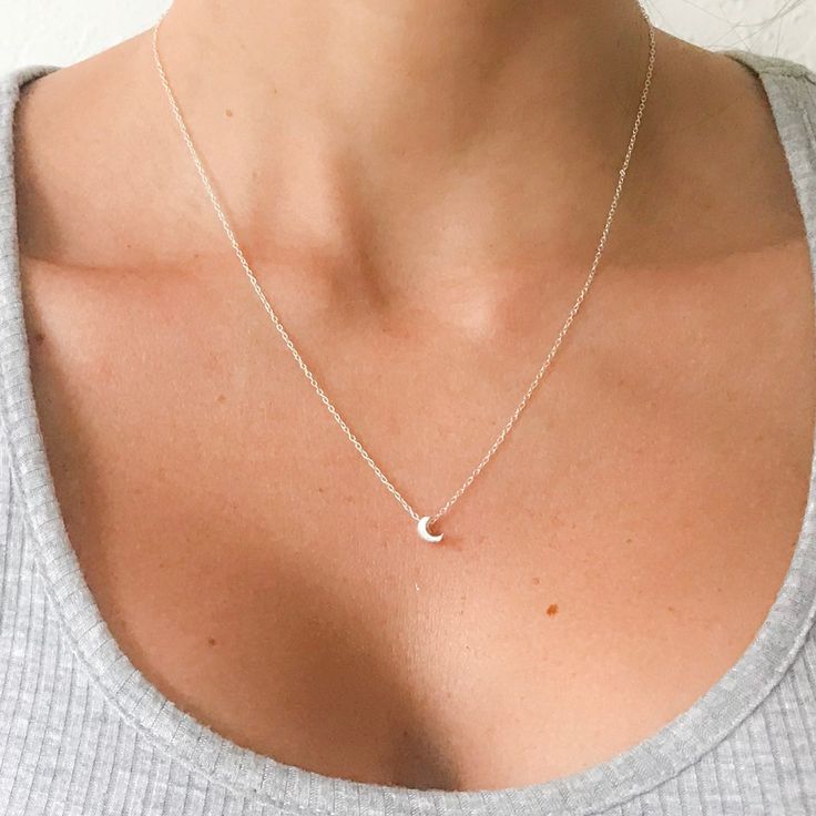 Treat Yourself Or Someone You Love With Our Crescent Moon Silver Necklace Is Delicate And Easy To Wear Everyday. Material : 925 Sterling Silver. Silver Weight : 1.25g Pendant Size : 5mm X 5mm. Length : 45cm. This Dainty Necklace Is Handcrafted From 925 Sterling Silver, That Doesn't Tarnish Your Neck Also Hypoallergenic And Nickel Free. Every Time You Purchase From Us You Get A Little Gift For You ! All Our Items Are Ship It In A Organza Bag Inside Off A Waterproof Envelope. Design With Love Dainty Silver Chain Necklace, Everyday Moon-shaped Jewelry, Sterling Silver Moon Charm Necklace For Everyday, Everyday Sterling Silver Charm Necklace With Moon Charm, Dainty Moon-shaped Jewelry For Everyday, Dainty Silver Moon Shaped Jewelry, Sterling Silver Moon Phase Charm Necklaces, Dainty Crescent Charm Necklaces For Everyday, Silver Crescent Charm Necklace