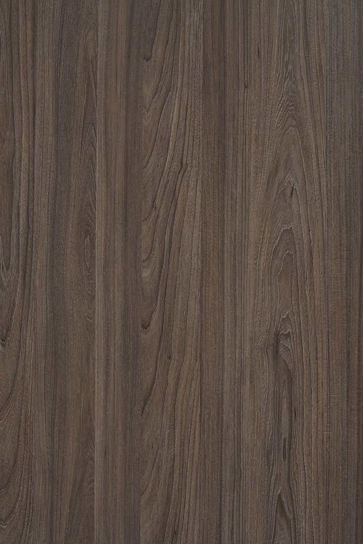 a close up view of the wood grains on this flooring material that is dark brown