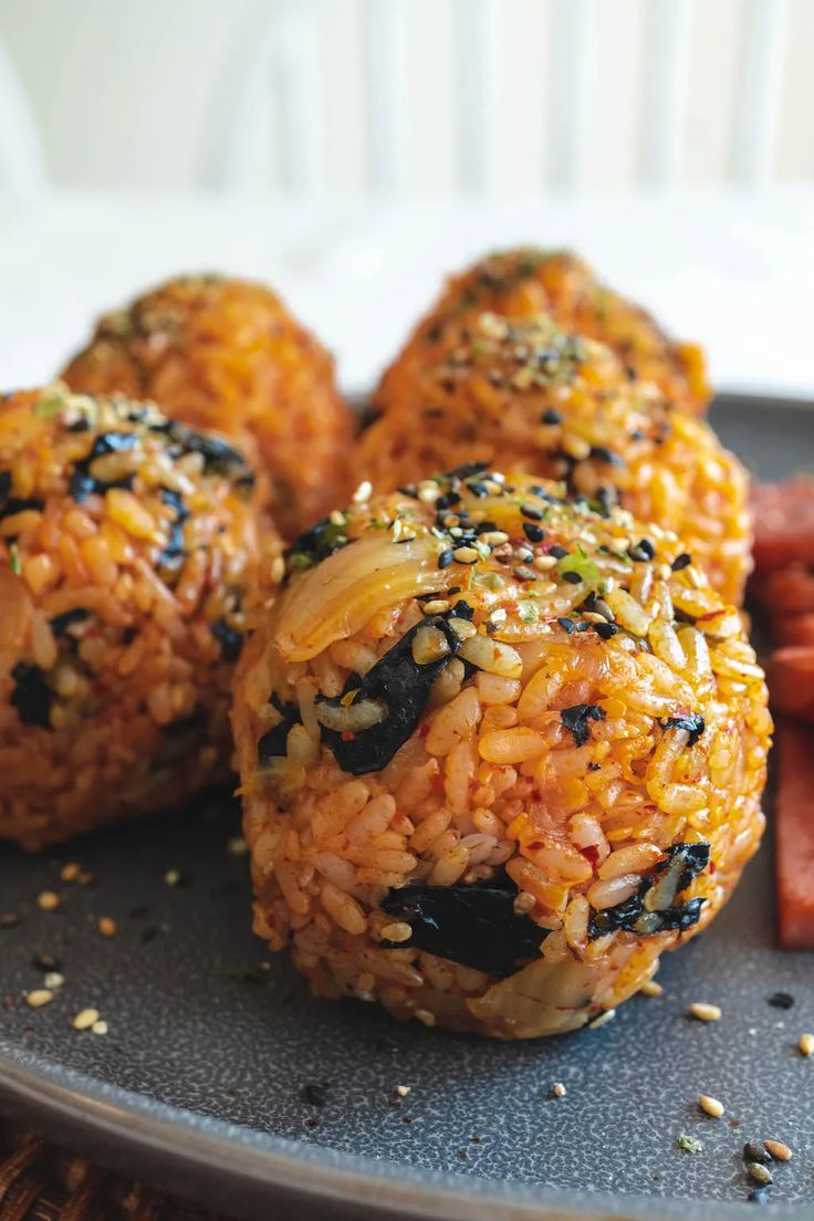 some food on a plate with carrots and rice