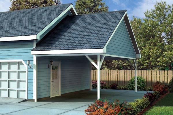 a blue garage with a black roof and white trim