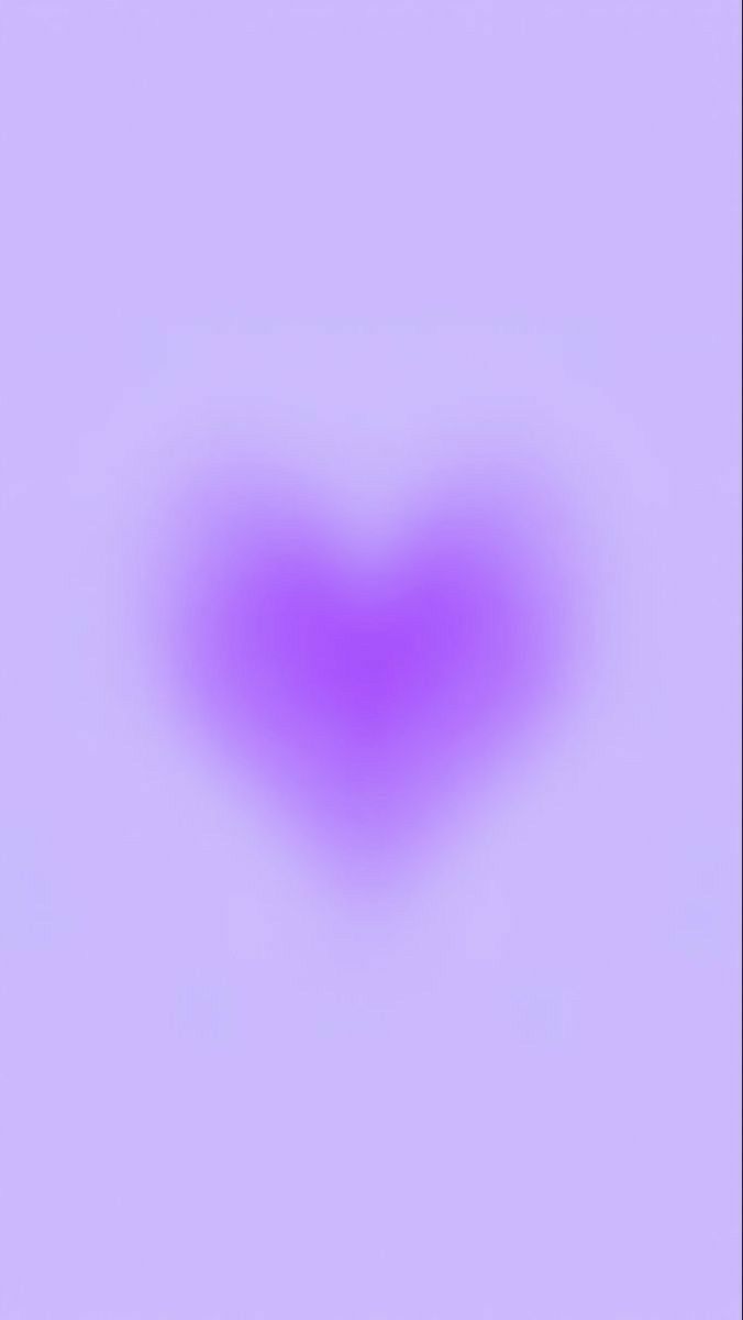 an abstract blurry background with pink and purple colors