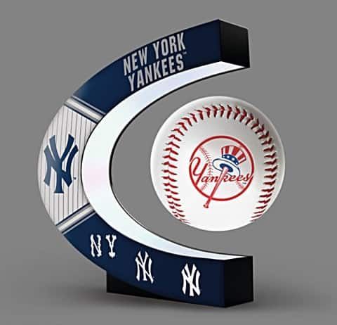 the new york yankees baseball trophy is shown in front of a white background with blue lettering